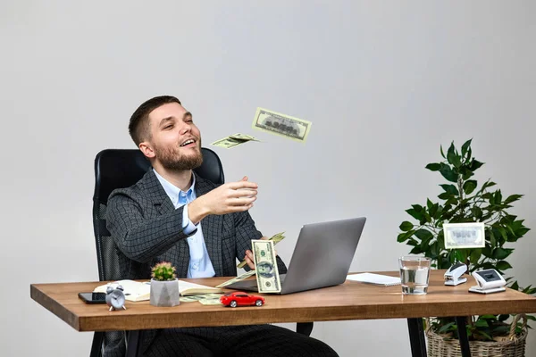 Young Bearded Businessman Working Laptop Throwing Money While Sitting Chair — Stock Photo, Image