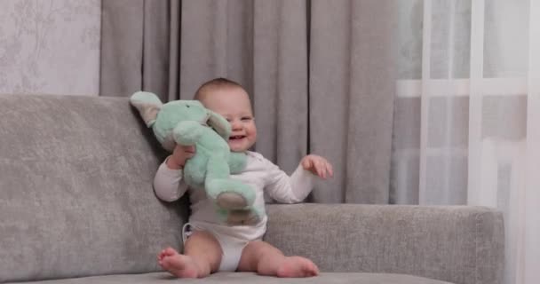 Cute Baby Girl Playing Soft Toy Bunny Home — Stock Video
