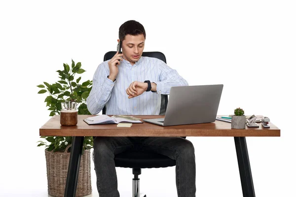 Surprised Businessman Looking Watch While Working Laptop Having Phone Conversation — Stock Photo, Image