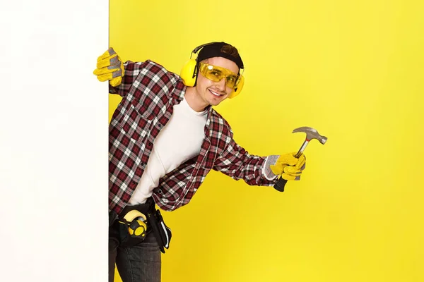 Smiling Professional Builder Work Clothes Helmet Holding Hammer Copy Space — Stock Photo, Image