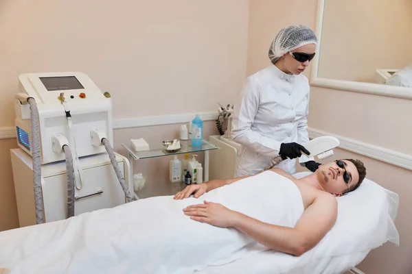 Young Man Receiving Epilation Beauty Center Professional Beautician Doing Laser — Stock Photo, Image