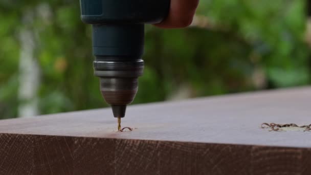 Man Using Drill Make Hole Wood — Stock Video