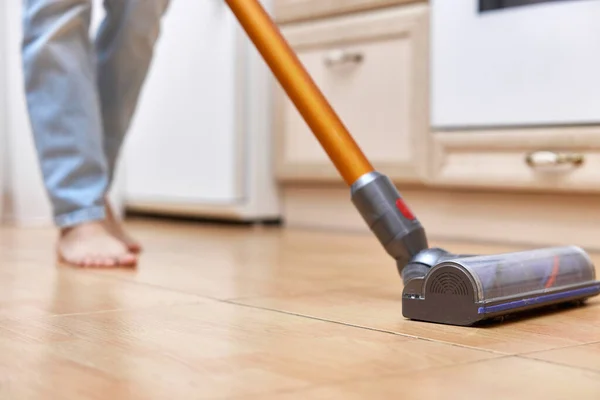 Close Woman Uses Cordless Vacuum Cleaner Clean Floor — Stock Photo, Image