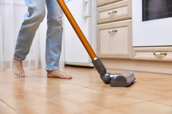 Close Woman Uses Cordless Vacuum Cleaner Clean Floor — Stock Photo, Image
