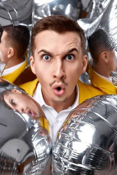 Portrait Surprised Man Yellow Jacket Lot Silver Air Balloons Birthday — Stock Photo, Image