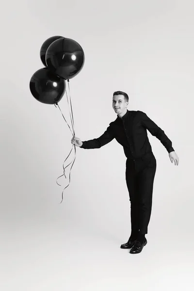 Elegant Caucasian Man Bunch Black Air Balloons White Background Black — Stock Photo, Image