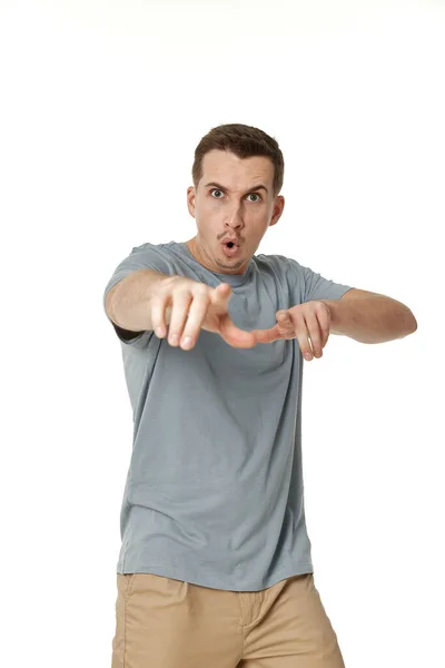 Surprised Guy Pointing Camera White Studio Background — Stock Photo, Image