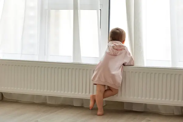 Little Child Girl Standing Window Looking Back View — Stock Photo, Image
