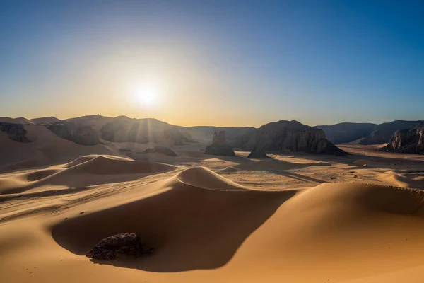 stock image view in the Sahara desert of Tadrart rouge tassili najer in Djanet City  ,Algeria.colorful orange sand, rocky mountains