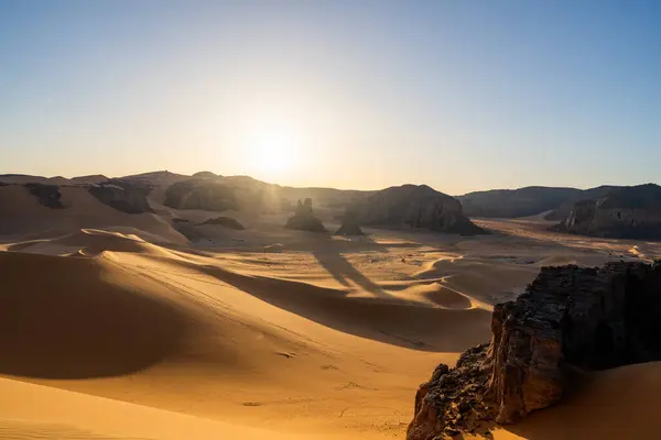 stock image view in the Sahara desert of Tadrart rouge tassili najer in Djanet City  ,Algeria.colorful orange sand, rocky mountains