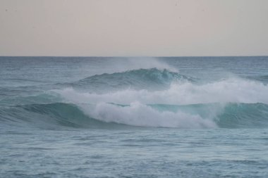 Small waves during dusk