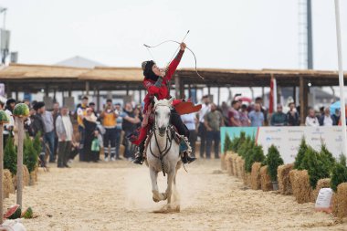 ISTANBUL, TURKIYE - JUNE 11, 2022: Horse Archery show during Etnospor Culture Festival