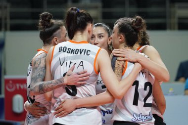 ISTANBUL, TURKEY - APRIL 22, 2022: Eczacibasi Dynavit players celebrating score point during Fenerbahce Opet Turkish Sultans League Playoff 1-4 match in Burhan Felek Sport Hall