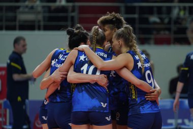 ISTANBUL, TURKEY - APRIL 06, 2022: Fenerbahce Opet players celebrating score point during Vakifbank CEV Champions League Volley Semi Final match in Vakifbank Sport Hall