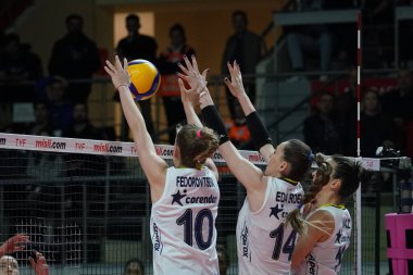 ISTANBUL, TURKEY - APRIL 30, 2022: Arina Fedorovtseva and Eda Erdem Dundar in action during Fenerbahce Opet vs Vakifbank Turkish Sultans League Playoff Final match in Burhan Felek Sport Hall