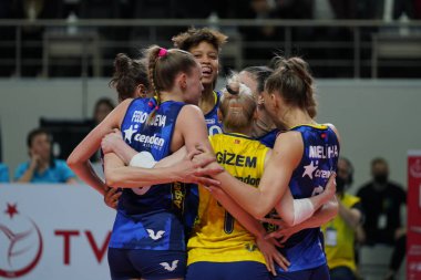 ISTANBUL, TURKEY - APRIL 06, 2022: Fenerbahce Opet players celebrating score point during Vakifbank CEV Champions League Volley Semi Final match in Vakifbank Sport Hall