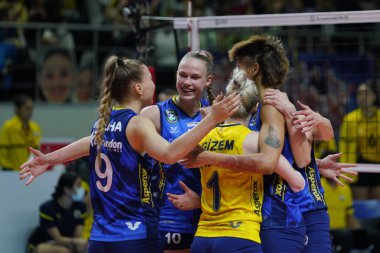 ISTANBUL, TURKEY - APRIL 06, 2022: Fenerbahce Opet players celebrating score point during Vakifbank CEV Champions League Volley Semi Final match in Vakifbank Sport Hall