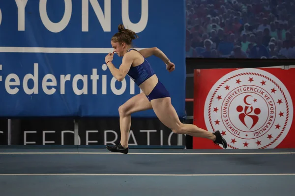 ISTANBUL, TURKEY - FEBRUARY 26, 2022: Undefined athlete running during Turkish Indoor Athletics Championships in Atakoy Athletics Arena