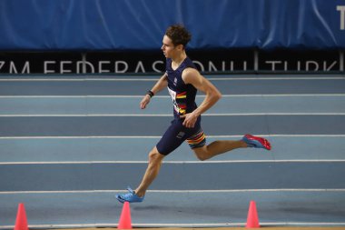 ISTANBUL, TURKEY - MARCH 05, 2022: Undefined athlete running during Balkan Athletics Indoor Championships in Atakoy Athletics Arena