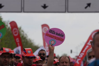 ISTANBUL, TURKEY - MAY 01, 2022: People march in International Workers Day