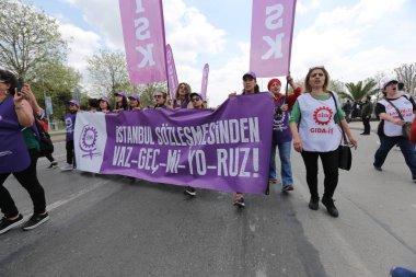 ISTANBUL, TURKEY - MAY 01, 2022: People march in International Workers Day
