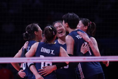 ANKARA, TURKIYE - JUNE 04, 2022: China players celebrating score point during Italy VNL Pool match in Ankara Arena