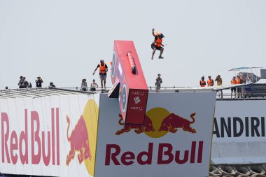 ISTANBUL, TURKIYE - AUGUST 14, 2022: Competitor performs a flight with hand made human powered flying machine on Red Bull Flugtag