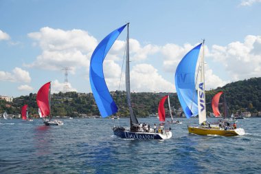 ISTANBUL, TURKIYE - SEPTEMBER 24, 2022: Sailboats competing in Bosphorus Cup