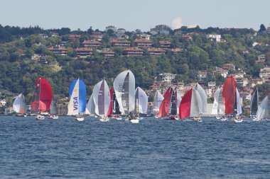 ISTANBUL, TURKIYE - SEPTEMBER 24, 2022: Sailboats competing in Bosphorus Cup