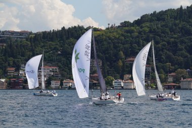 ISTANBUL, TURKIYE - SEPTEMBER 24, 2022: Sailboats competing in Bosphorus Cup