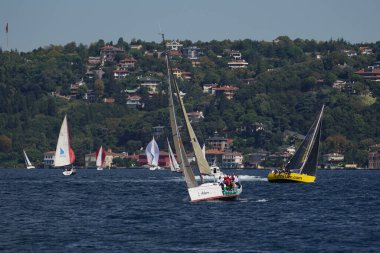 ISTANBUL, TURKIYE - SEPTEMBER 24, 2022: Sailboats competing in Bosphorus Cup
