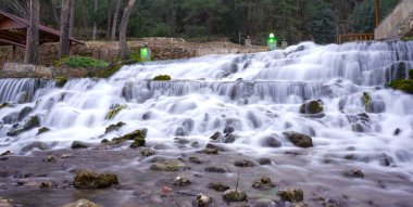 Long Exposure River Landscape During Fall Season