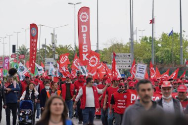 ISTANBUL, TURKEY - MAY 01, 2022: People march in International Workers Day