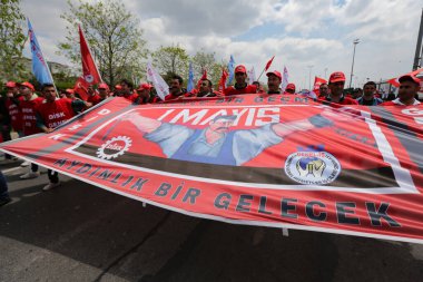 ISTANBUL, TURKEY - MAY 01, 2022: People march in International Workers Day