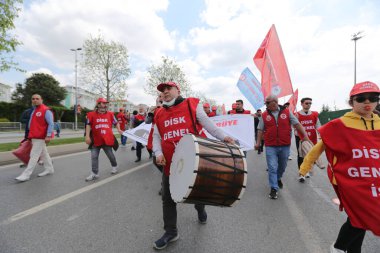 ISTANBUL, TURKEY - MAY 01, 2022: People march in International Workers Day