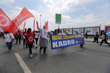 ISTANBUL, TURKEY - MAY 01, 2022: People march in International Workers Day