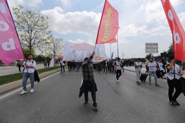 ISTANBUL, TURKEY - MAY 01, 2022: People march in International Workers Day