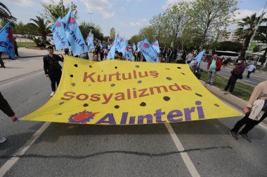 ISTANBUL, TURKEY - MAY 01, 2022: People march in International Workers Day