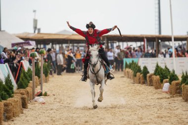 ISTANBUL, TURKIYE - JUNE 11, 2022: Horse Archery show during Etnospor Culture Festival