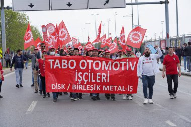 ISTANBUL, TURKEY - MAY 01, 2022: People march in International Workers Day