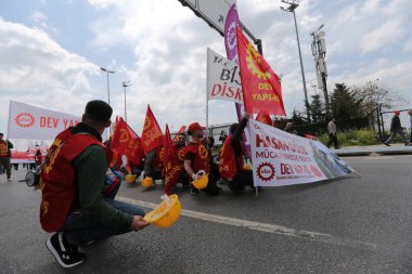 ISTANBUL, TURKEY - MAY 01, 2022: People march in International Workers Day