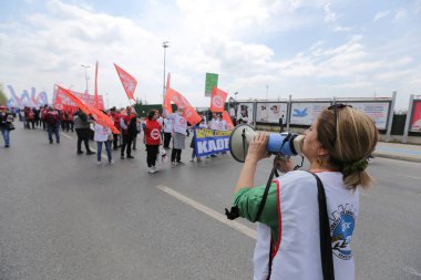 ISTANBUL, TURKEY - MAY 01, 2022: People march in International Workers Day