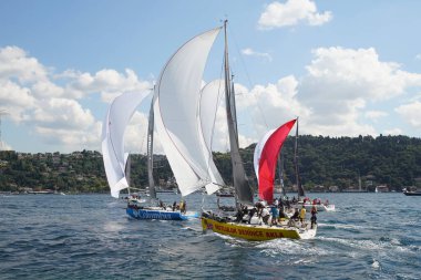 ISTANBUL, TURKIYE - SEPTEMBER 24, 2022: Sailboats competing in Bosphorus Cup