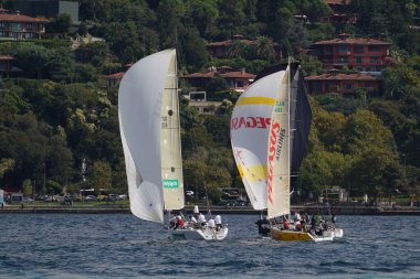 ISTANBUL, TURKIYE - SEPTEMBER 24, 2022: Sailboats competing in Bosphorus Cup