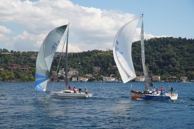 ISTANBUL, TURKIYE - SEPTEMBER 24, 2022: Sailboats competing in Bosphorus Cup