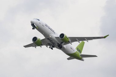 ISTANBUL, TURKIYE - OCTOBER 08, 2022: Air Baltic Airbus A220-371 (55165) take-off from Istanbul Ataturk Airport