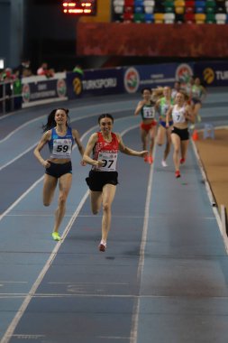 ISTANBUL, TURKEY - MARCH 05, 2022: Athletes running during Balkan Athletics Indoor Championships in Atakoy Athletics Arena