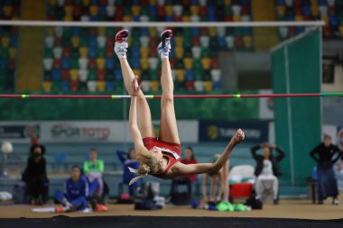 ISTANBUL, TURKEY - MARCH 05, 2022: Marija Vukovic high jumping during Balkan Athletics Indoor Championships in Atakoy Athletics Arena
