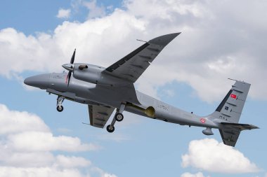 KONYA, TURKIYE - JUNE 30, 2022: Baykar Technologies Bayraktar Akinci UCAV Tiha (PT-5) takeoff from Konya Airport during Anatolian Eagle Air Force Exercise