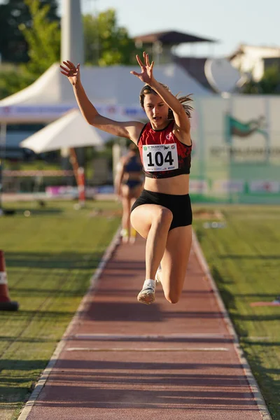 stock image DENIZLI, TURKIYE - JULY 16, 2022: Undefined athlete triple jumping during Balkan Athletics U20 Championships in Denizli Albayrak Athletics Track